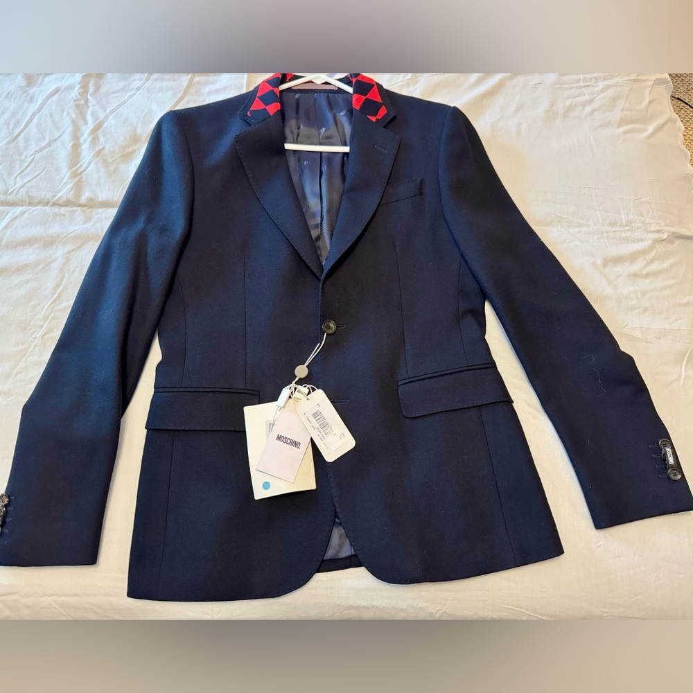 brand new Moschino navy blue wool sportcoat.Perfect condition with tags size 48